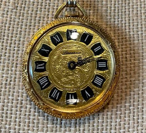 fake swiss made pendant watch lucerne floral embossed|lucerne watches problems.